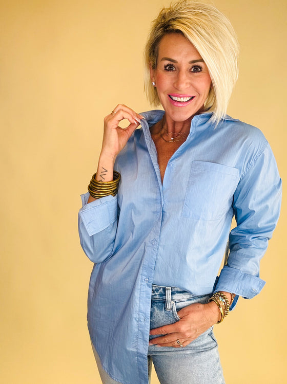 The promise button top blue
