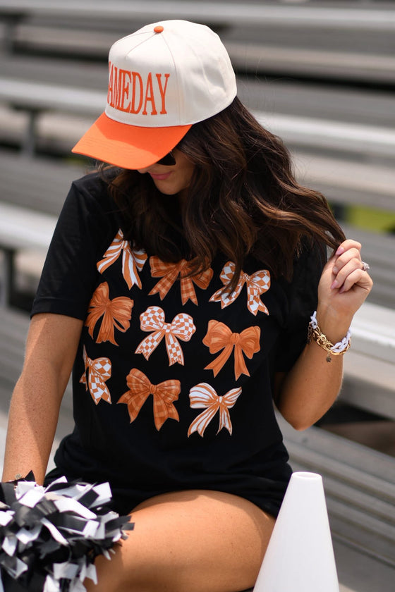 Orange and white bow tee