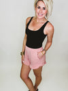 MAKING MOVES IN MAUVE SHORTS